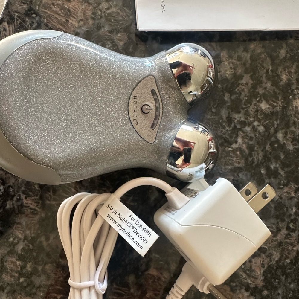 NuFACE Trinity Mini Silver Facial Toning Device with bag and charger
